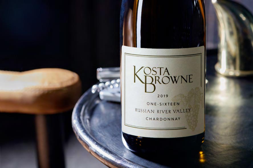 Exclusive Cult Wines - Bottle of Kosta Brown One-Sixteen Russian River Valley Chardonnay on metal table.